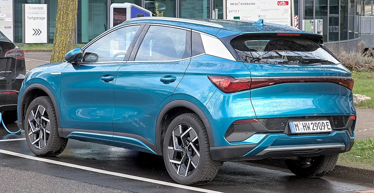 A blue BYD Atto 3 seen from behind