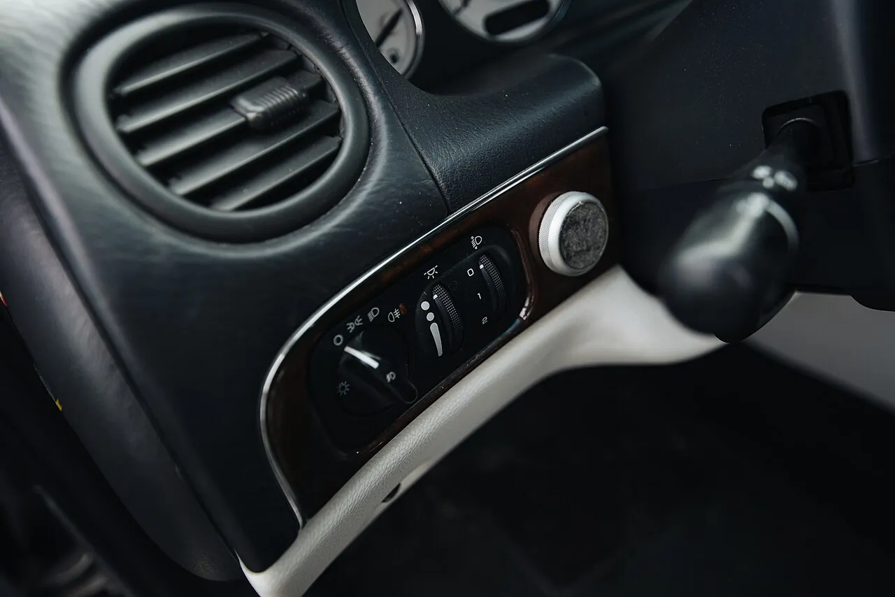 A dashboard with A/C controls, since cooling matters to used car value in the UAE